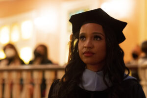 A doctorate student in her cap and gown at Brenau's winter commencement 2021.