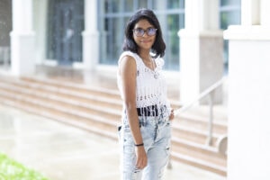 Ana Gabriela Perez poses for the camera in front of the Burd Center