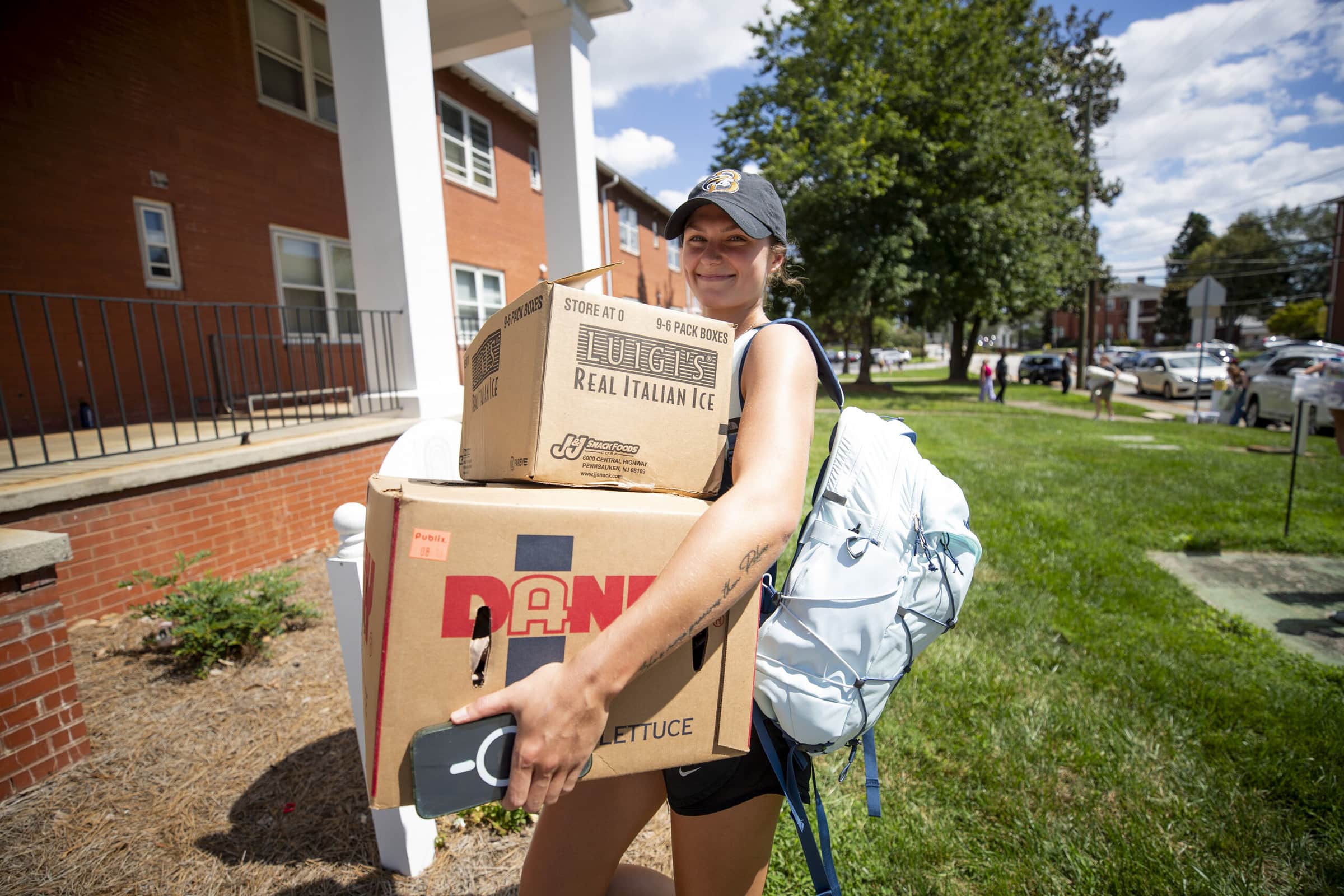 Student Carrying Boxes