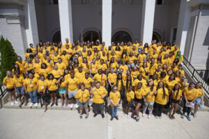 Group of students in yellow shirts