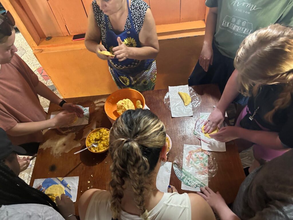 Making empanadas with the coffee farmer's family