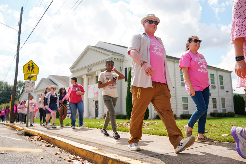 College of education faculty and students walk the Brenau mile during the pink out