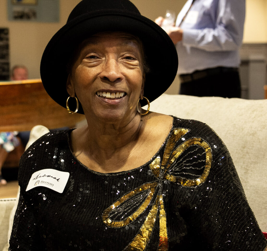 A Brenau alum smiles for the camera