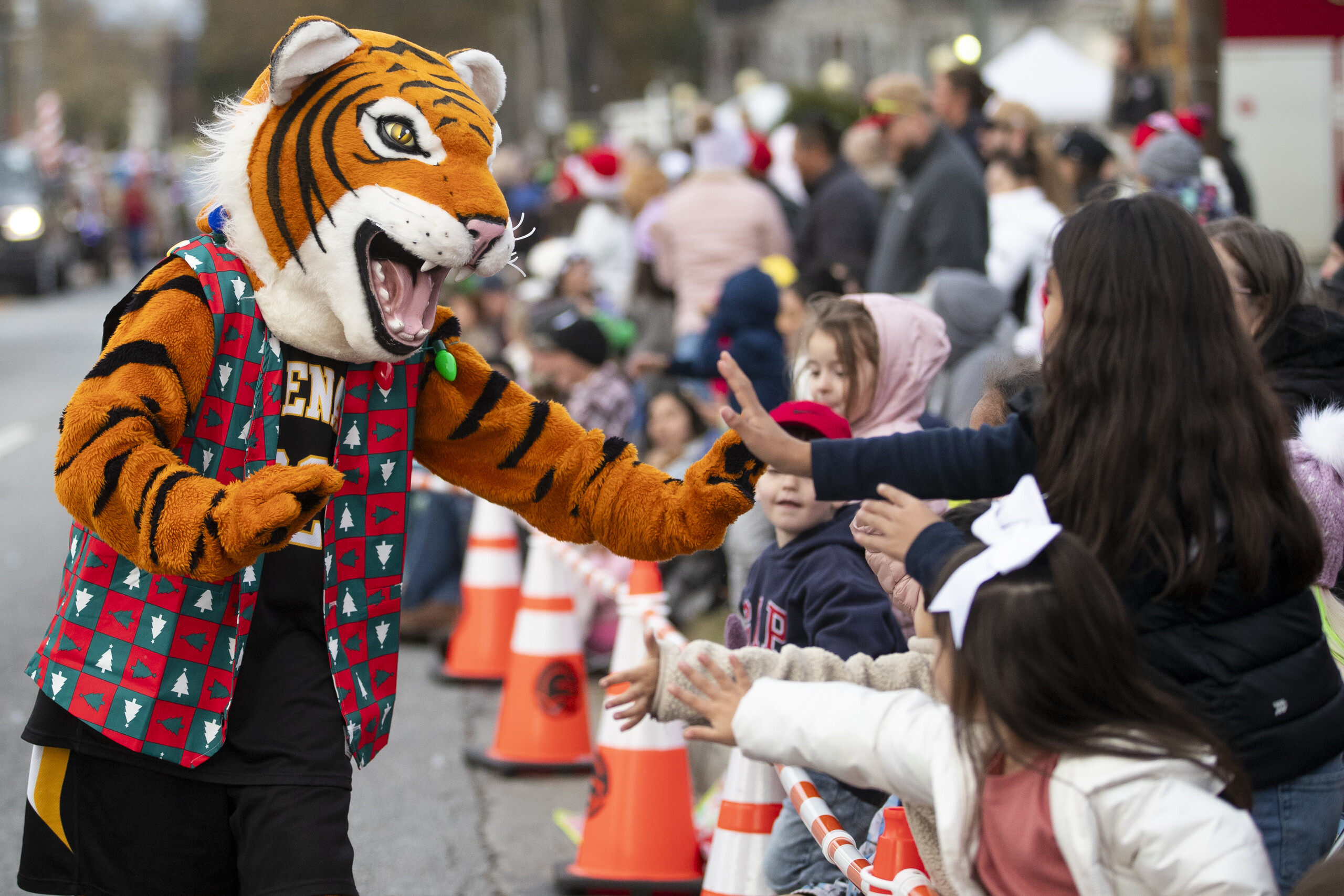 HJ gives a high five at Christmas on Green St